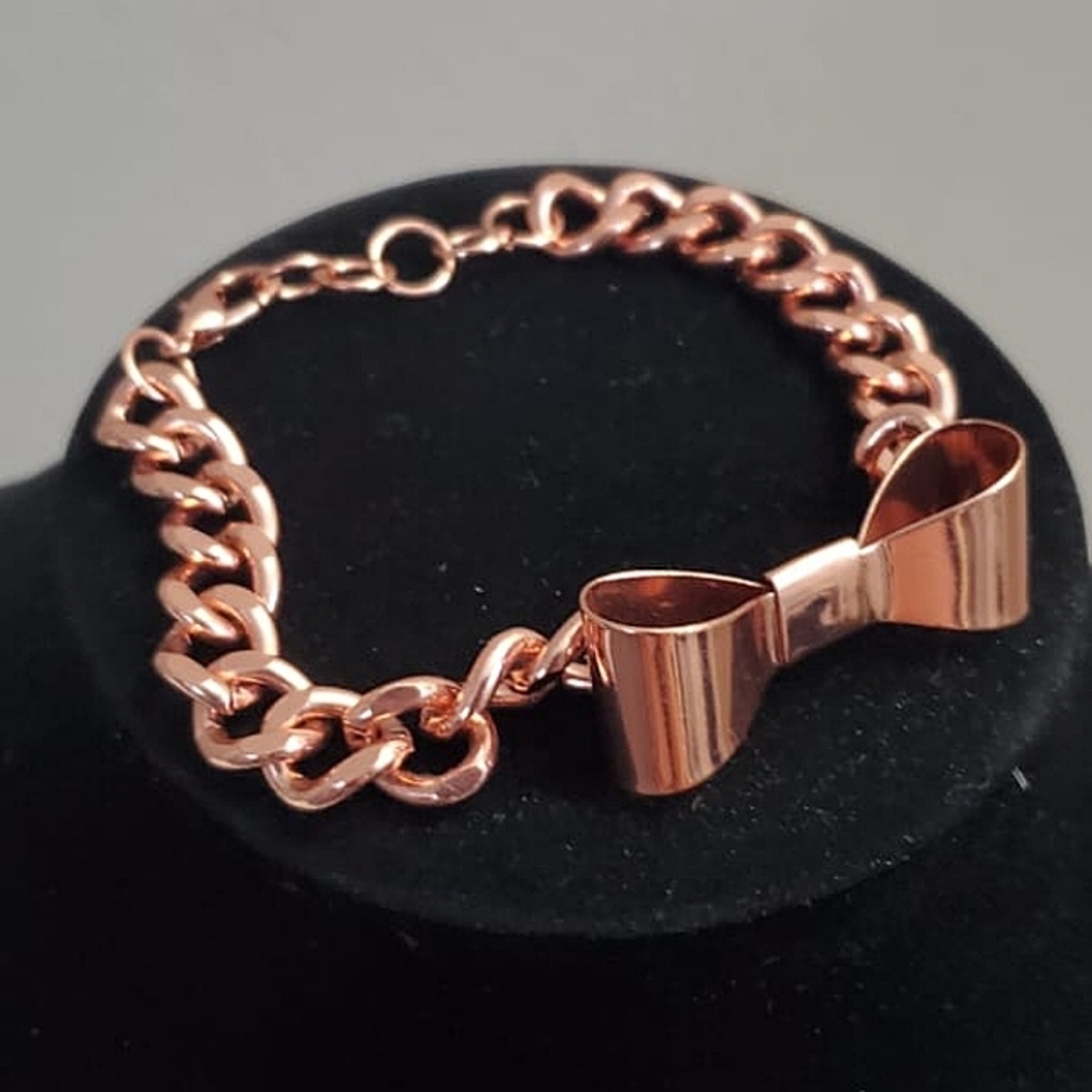 Pandora Women's RoseGold Tone Bowknot  Bracelet.